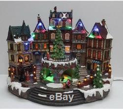 12.5 in. Animated Holiday Downtown Village House Musical Christmas Decor Diplay