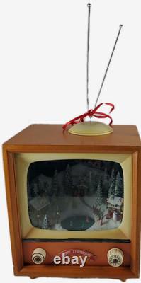 2012 Roman Animated Musical Christmas TV Moving Skaters & Winter Village Scene 2012 Roman Animated Musical Christmas TV Moving Skaters & Winter Village Scene