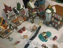 60 Piece Beautiful Lighted Christmas Village Set, stores, people, trees and more