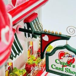 Department 56 Cupid's Cardshop Snow Village Celebrate Love 55384 IN BOX READ