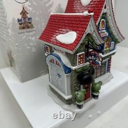 Department 56 North Pole Village Mickey's Pin Traders Lighted House With Figure