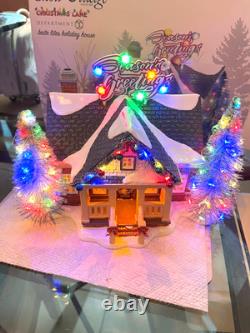 Department 56 Snow Village Brite Lites Holiday House 6003131 has box intact