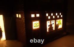 Department 56 Snow Village Illuminated Abners Implement Company and Original Box