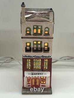 Dept 56 Christmas In the City 6512-9 Toy Shop Pet Store Bakery & Restaurant (3)