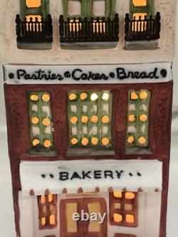 Dept 56 Christmas In the City 6512-9 Toy Shop Pet Store Bakery & Restaurant (3)