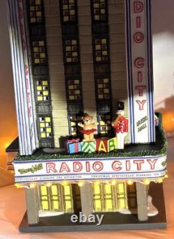 Dept 56 Christmas in City Series Radio City Music Hall & Handsom Cab