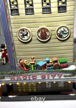 Dept 56 Christmas in City Series Radio City Music Hall & Handsom Cab