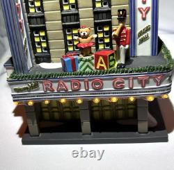 Dept 56 Christmas in City Series Radio City Music Hall & Handsom Cab