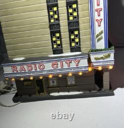 Dept 56 Christmas in City Series Radio City Music Hall & Handsom Cab