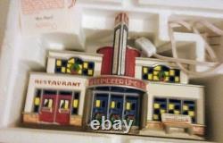 Dept 56 Village Animated Skating Pond with all accessories shown