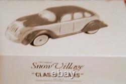 Dept 56 Village Animated Skating Pond with all accessories shown