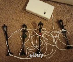 Dept 56 Village Animated Skating Pond with all accessories shown