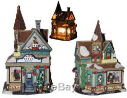 Eleven-piece Christmas Village lighted porcelain figurines