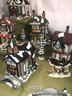 Grandeur Noel 40 Piece Victorian Village lighted Christmas House Set