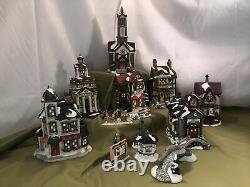 Grandeur Noel 40 Piece Victorian Village lighted Christmas House Set