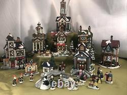 Grandeur Noel 40 Piece Victorian Village lighted Christmas House Set