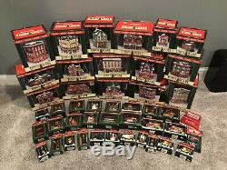 Huge lot of 45 Coca Cola Christmas Village and accessories in original boxes