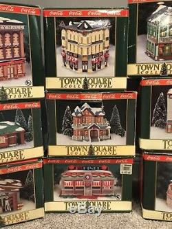 Huge lot of 45 Coca Cola Christmas Village and accessories in original boxes