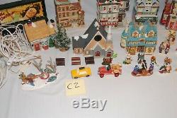 Huge lot of mixed Coca-Cola, Dept 56, lemax & other Christmas Village figures C2