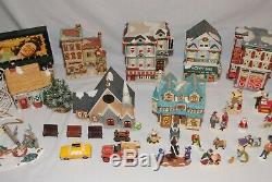 Huge lot of mixed Coca-Cola, Dept 56, lemax & other Christmas Village figures C2