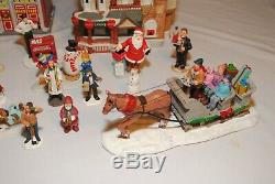 Huge lot of mixed Coca-Cola, Dept 56, lemax & other Christmas Village figures C2