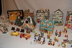 Huge lot of mixed Coca-Cola, Dept 56, lemax & other Christmas Village figures C2