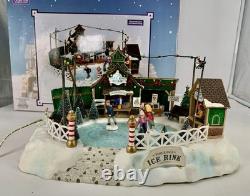 LEMAX Carole Towne Pine Ridge Ice Rink Animated Holiday Village Lights & Sound