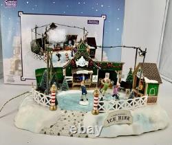 LEMAX Carole Towne Pine Ridge Ice Rink Animated Holiday Village Lights & Sound