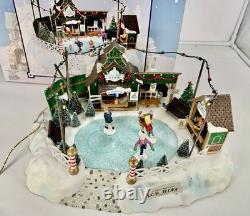 LEMAX Carole Towne Pine Ridge Ice Rink Animated Holiday Village Lights & Sound