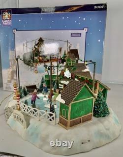 LEMAX Carole Towne Pine Ridge Ice Rink Animated Holiday Village Lights & Sound