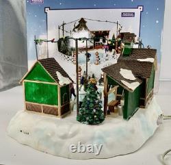 LEMAX Carole Towne Pine Ridge Ice Rink Animated Holiday Village Lights & Sound