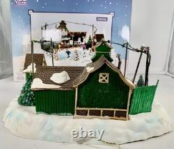 LEMAX Carole Towne Pine Ridge Ice Rink Animated Holiday Village Lights & Sound