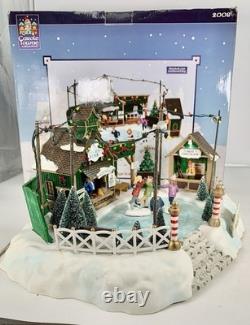 LEMAX Carole Towne Pine Ridge Ice Rink Animated Holiday Village Lights & Sound