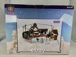 LEMAX Carole Towne Pine Ridge Ice Rink Animated Holiday Village Lights & Sound