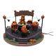 Lemax Spooky Town Pumpkin Tilt-n-Hurl Lights & Animated Read