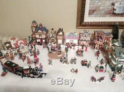 Lighted Christmas Village Animated Skating Pond 11 houses, 200 figures, more