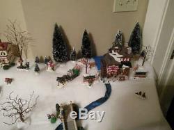 Lighted Christmas Village Animated Skating Pond 11 houses, 200 figures, more