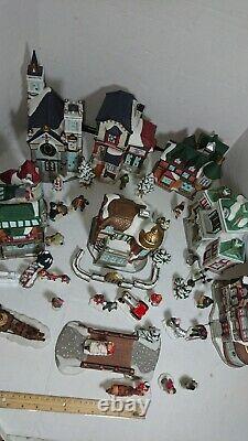 Porcelain Victorian Christmas village set houses and figurines Lot Of 40