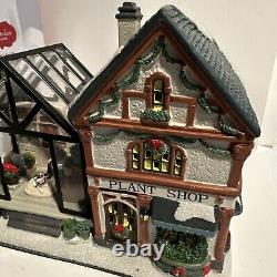 St Nicholas Square Village Plant Shop Greenhouse Man Dog Lighted House withBox